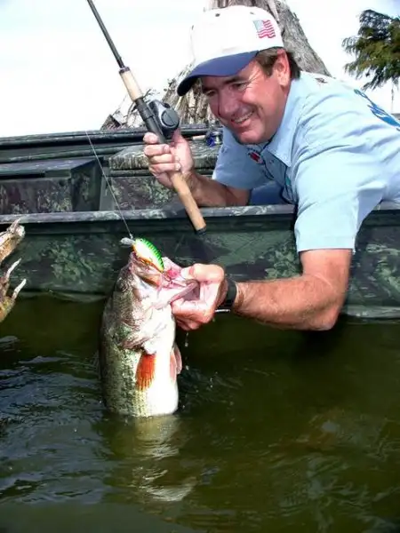 larry nixon holding bass